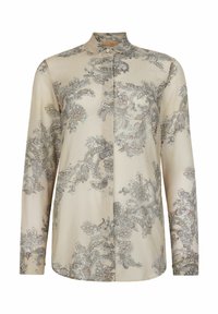 Långärmad, beige blus med ett subtilt blommönster i grått och brunt. Har en krage och framknäppning, tillverkad av ett slätt tyg.