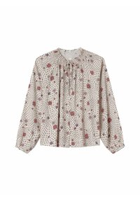 Blouse à motif floral avec des manches longues, encolure froncée et fond beige clair. Présente des fleurs rouges et violettes ainsi qu'un tissu texturé.