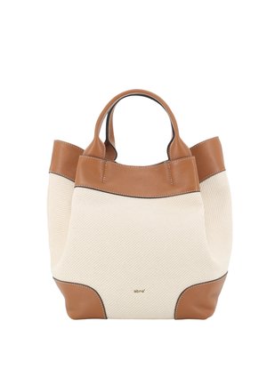 Beige Stoff-Tragetasche mit braunen Lederakzenten, Griffen und Ecken, mit kleinem goldfarbenem "abro"-Logo in der Mitte vorne.
