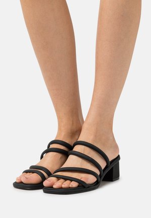 PENNELOPE - Heeled mules - black