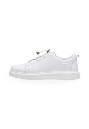 White low-top sneaker with perforated side panels, elastic toggle laces, padded collar, and flat rubber sole.