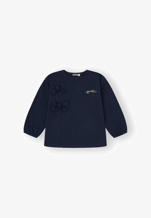 Top de manga larga azul marino hecho de material suave, con dos lazos de tela y detalle en texto dorado "brillante" en la parte frontal.