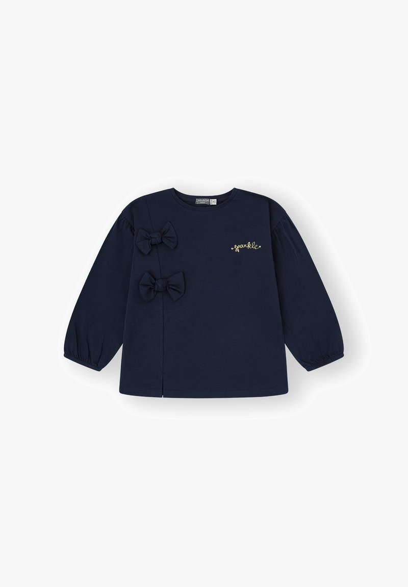 Top de manga larga azul marino hecho de material suave, con dos lazos de tela y detalle en texto dorado "brillante" en la parte frontal.