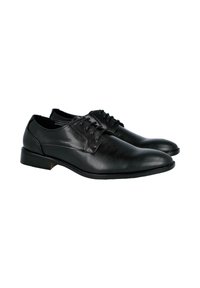 Zapatos de vestir de cuero negro con acabado liso, diseño con cordones, punta redondeada y tacón bajo. Presentan costuras sutiles y una silueta elegante.