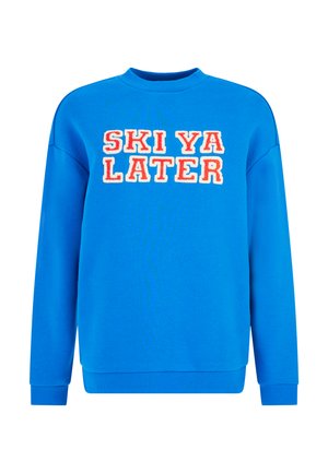 Blue sweatshirt with “SKI YA LATER” in red and white bold lettering. Features a crew neck and ribbed cuffs and hem. Soft, cotton blend material.