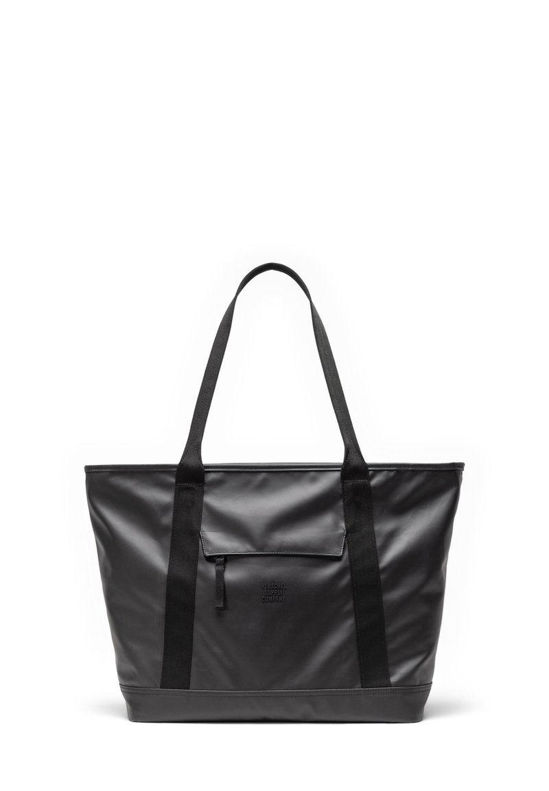 Black tote bag made of smooth, durable material with two long straps, a front pocket, and embossed branding. Rectangular shape with a flat base.