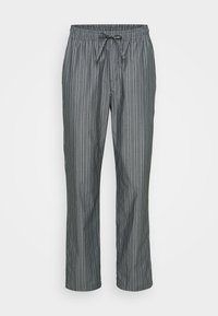 Grijze gestreepte broek van lichtgewicht stof. Voorzien van een elastische tailleband met een trekkoord en twee rechte pijpen met verticale strepen.