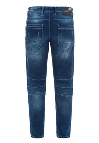 Dunkelblaue Denim-Jeans mit einem ausgewaschenen Finish. Besitzt einen Fünf-Taschen-Stil, gestickte Akzente und schmal zulaufende Beine. Metallteile sind enthalten.