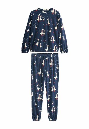 Navy pajama set with long sleeves and elastic cuffs featuring a repeating pattern of white ducks and stars, made from soft fabric.