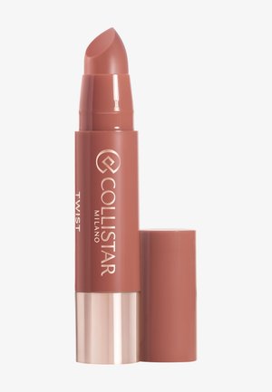 Crayon à lèvres Collistar dans une nuance nude mate, avec un mécanisme de rotation, une texture lisse, et une étiquette dorée métallique sur un étui cylindrique.