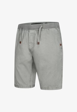 Gray shorts made of soft fabric, featuring an elastic waistband, drawstring, and side pockets. Simple design with subtle stitching details.