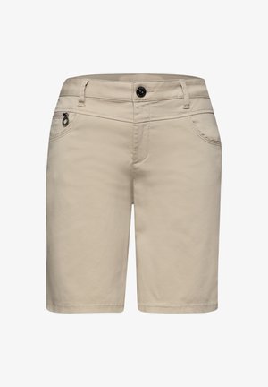 Beżowe spodenki do kolan z zapięciem na guziki, szlufkami na pasek, przednimi kieszeniami oraz małą kieszenią na zamek po prawej stronie.