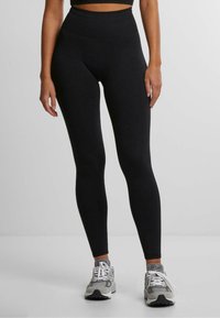 aim’n® - SHAPE SEAMLESS - Leggings - Hosen - black Thumbnail-Bild 1