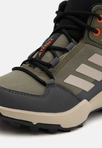 Adidas Terrex AX4R UNISEX - Turistické topánky - olive strata/wonder beige/semi impact orange