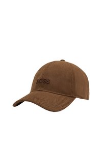 Brown corduroy baseball cap featuring a curved brim and embossed "BOSS" logo in a darker shade, showcasing a textured surface.