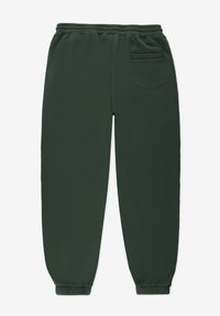 Zielone dresy wykonane z miękkiego materiału, z elastycznym pasem, ściągaczami na kostkach oraz tylną kieszenią z haftowanym detalem.