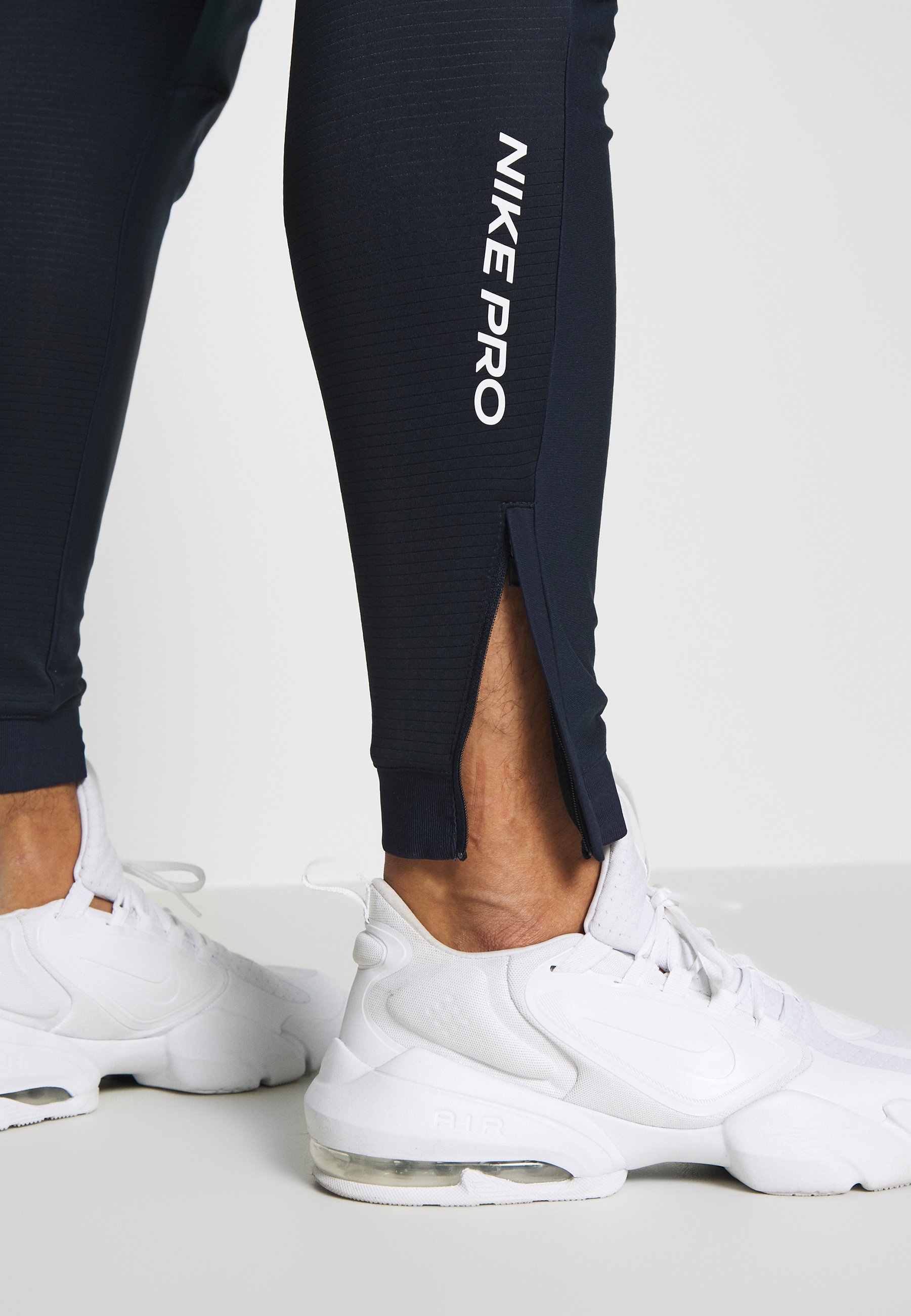 nike pro tracksuit bottoms