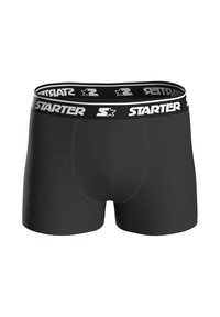 Black boxer shorts made of soft fabric. Features a wide elastic waistband with "STARTER" logo in white. Smooth texture, fitted design.