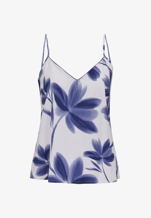 Canottiera bianca senza maniche con spalline sottili e grandi motivi floreali blu in stile acquerello.