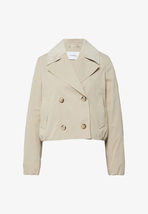 Beżowa, krótka, dwurzędowa kurtka z szerokim kołnierzem z sztruksu, czterema guzikami, dwoma skośnymi przednimi kieszeniami oraz elastycznymi mankietami i dołem.