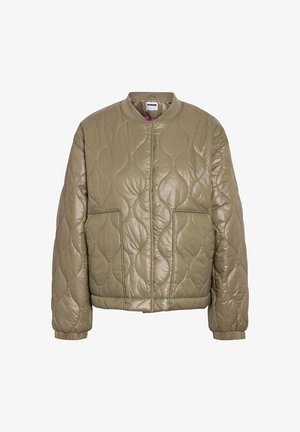 Light brown quilted jacket with long sleeves, two front pockets, elastic cuffs, and a round collar.