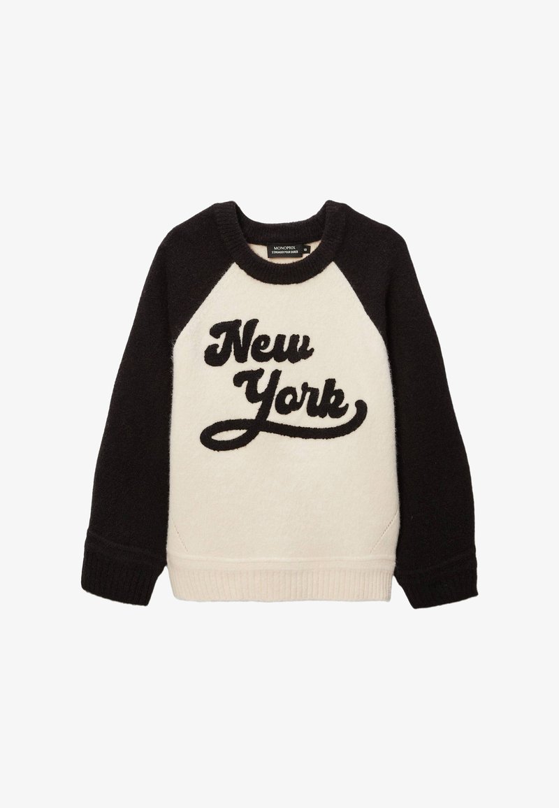 Sweatshirt noir et crème avec des manches raglan, présentant une texture douce et "New York" brodé en cursive sur le devant.