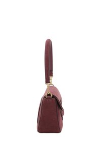 Compact burgundy suede handbag with a top handle, black trim, and gold-tone hardware, shown from the side on a white background.