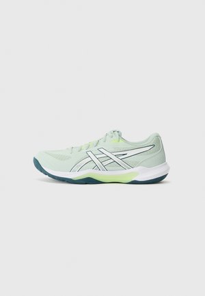 Light green athletic shoe featuring breathable mesh, white and silver accents, a cushioned sole, and a patterned rubber outsole.