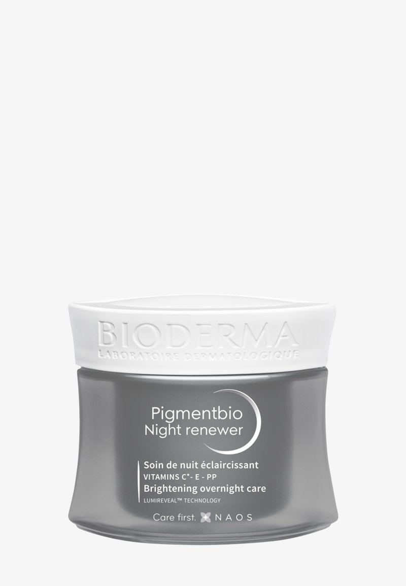 Barattolo di vetro grigio con coperchio di plastica bianco. L'etichetta riporta "Pigmentbio Night Renewer" e dettagli sugli ingredienti schiarenti.