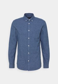 Blauwe button-up shirt in gestructureerde stof, met een kraag, een borstzak en witte knopen. Lange mouwen met een ronde zoom.
