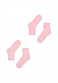 Chaussettes roses avec un design de couleur uni. Une paire présente un motif en forme de cœur, tandis que l'autre affiche le texte « LOVE » en impression contrastante.