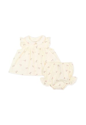 Vestitino color crema per neonati e mutandine abbinate con piccole stampe floreali rosa e dettagli arricciati sulle maniche e sugli orli delle gambe.