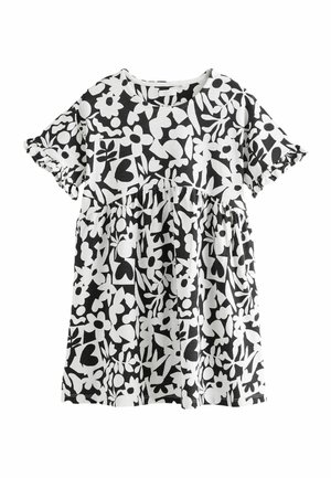 Robe pour enfant à manches courtes en noir et blanc, avec une taille froncée et un motif abstrait de fleurs et de feuilles.