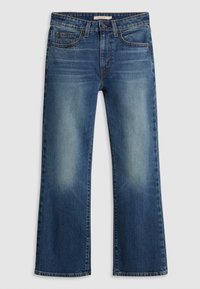 Jean en denim bleu à jambes larges avec une teinte délavée, design à cinq poches et accents de surpiqûre beige. Texture douce et détail d'ourlet brut.