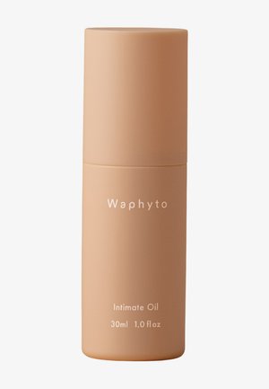 Bouteille cylindrique beige étiquetée Waphyto Intimate Oil, contenant 30 ml ou 1,0 once liquide de produit.