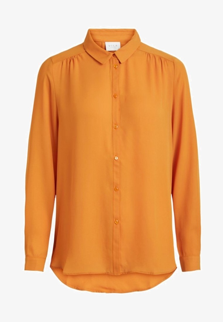 Blouse orange à manches longues, col pointu et boutons sur le devant, légèrement froncée aux coutures d'épaule et ourlet arrondi.