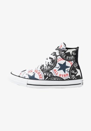 High-top Converse sneaker with white laces, rubber sole, black and white star patterns, and red and black "All Star" text design.
