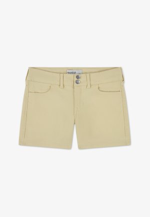 Geltoni džinso šortai su lygiu priekiu, dviem priekinėmis kišenėmis ir dviem sagų užsegimais. Lygi tekstūra ir klasikinis kirpimas. Matoma dydžio etiketė.