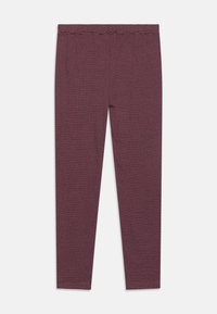 Leggings bordeaux avec des rayures blanches horizontales, présentant un design ajusté et une taille élastique. Fabriqués en tissu doux et extensible.