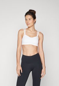 Nike Performance - ZENVY STRAPPY WOMENS LIGHT SUPPORT PADDED BRA - Neliela atbalsta sporta krūšturis - white Miniatūras attēls 1