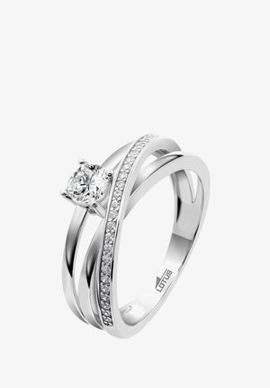 Silver ring with a round center stone and two intertwined bands, one featuring small diamonds along the edge, polished finish.