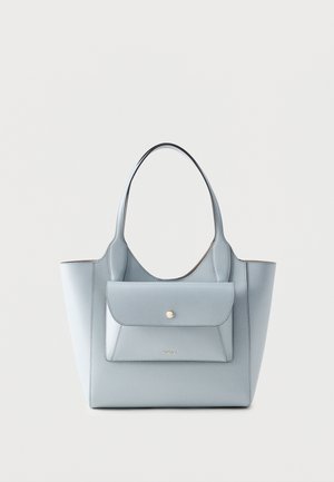 Light blue leather tote bag with two handles and a front flap pocket secured by a gold button, minimalistic design.