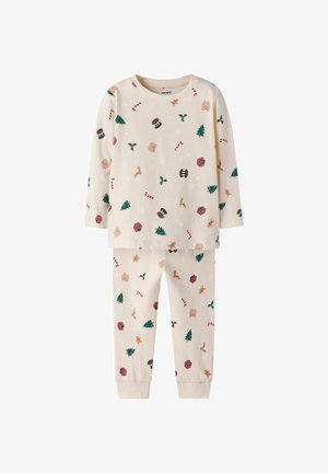 Zweiteiliger Pyjama aus Baumwolle mit einem cremfarbenen Hintergrund, der mit bunten, festlichen Mustern wie Bäumen, Geschenken und Zuckerstangen verziert ist.
