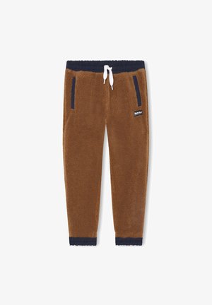 Brązowe spodnie dresowe z polaru z granatową elastyczną talią i ściągaczami, białym sznurkiem, bocznymi kieszeniami oraz naszywką z logo Timberland na prawej nodze.