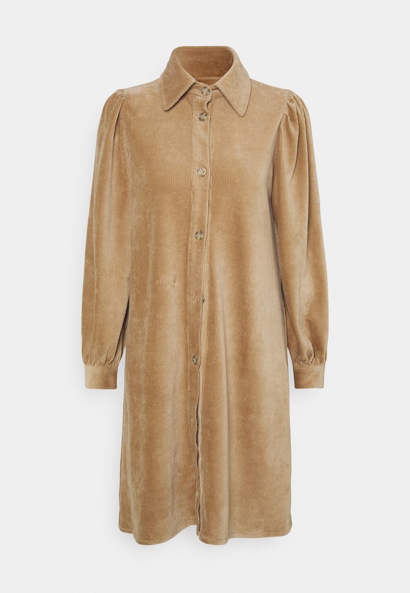 Kordkleid in Beige mit Kragen, langen Ärmeln mit gerafften Schultern und einer durchgehenden Knopfleiste. Strukturierter Stoff.