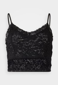 Bralette de encaje negro con patrones florales, tirantes finos ajustables y un dobladillo festoneado sobre un fondo blanco.