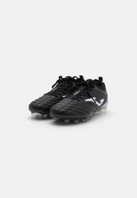 Black football boots with a textured upper, quilted design, and contrasting white logo. Features a lace-up closure and translucent studs.