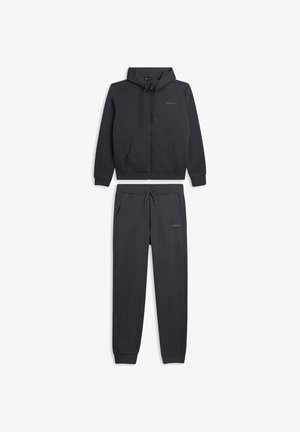 Conjunto de sudadera con capucha y pantalones de chándal gris oscuro hecho de tela suave. Sudadera con capucha con cremallera y bolsillos delanteros, pantalones con cintura ajustable con cordón.