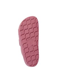 Pink rubber shoe sole with a wavy tread pattern, displaying size markings, smooth texture, and a slight curve at the heel.