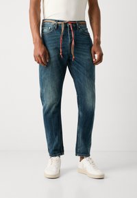 Scotch & Soda DEAN LOOSE TAPERED - Jean boyfriend - green touch